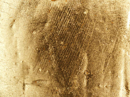 In gold painted wood texture using as luxury or festive background