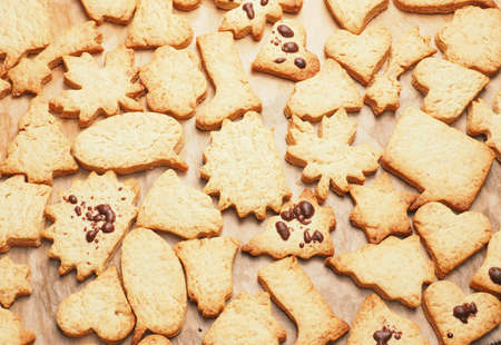 Tasty organic Christmas cookies on a baking sheet, traditional or seasonal food concept