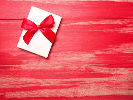 Red wooden Valentines Day background with space for your textの写真素材