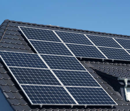 Solar panels on a roof, alternative energy, zero emission, sun power