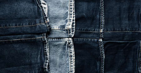 Panoramic texture of old used jeans using as header or backgroundの写真素材