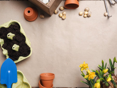 Gardening tools on a wooden table, spring time or gardening conceptの写真素材
