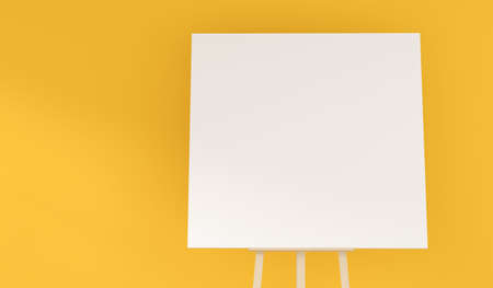 Wooden easel with a blank canvas in a yellow room with space for text on the wall, 3d renderingの写真素材
