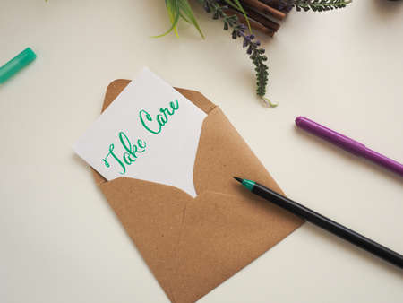 Personalized note with inscription Take Care in a natural color envelope, stay at home, health care...