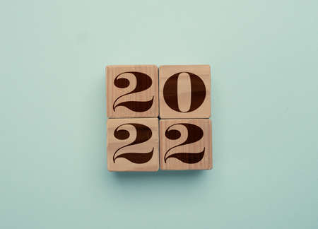 Wooden cubes with the Year number 2022, New Year concept, seasonal Christmas timeの写真素材