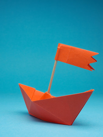 New ideas or transformation concept with a paper boat, transformation or teamwork, creativity, business conceptの写真素材