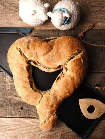 Yeast dough formed into a heart, baked until golden brown, traditional handwork, Easter breadの写真素材