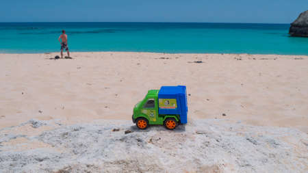 Toy truck on bermuda beach