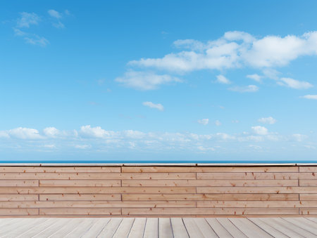a wooden deck with a view of the ocean and skyの素材
