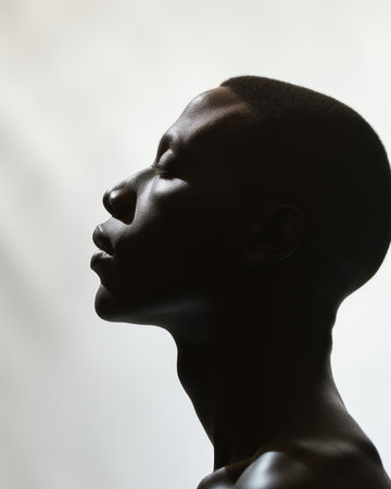 a silhouette of a man with his eyes closedの素材