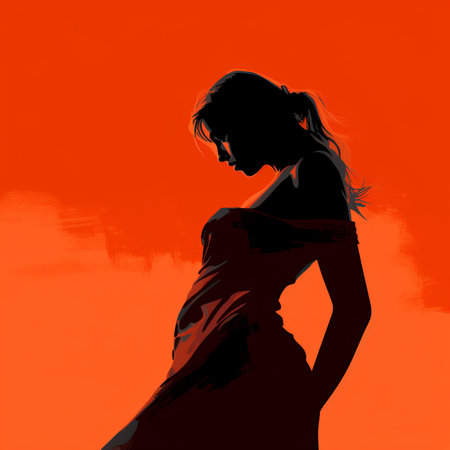 a woman in a black dress is standing in front of an orange backgroundの素材