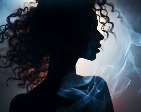 a woman with curly hair and smoke coming out of her mouthの素材