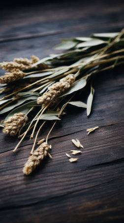 a bunch of wheat on a wooden tableの素材