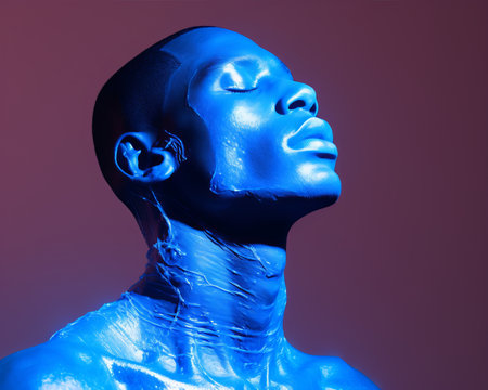 an image of a man with blue paint on his faceの素材