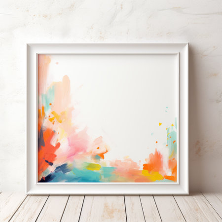 an abstract painting in a white frame on a wallの素材