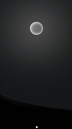 saturn and the moon in the night skyの素材