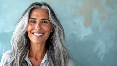 a woman with gray hair and a smileの素材
