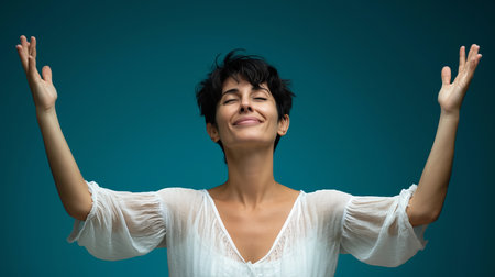 a woman with her hands up in the airの素材