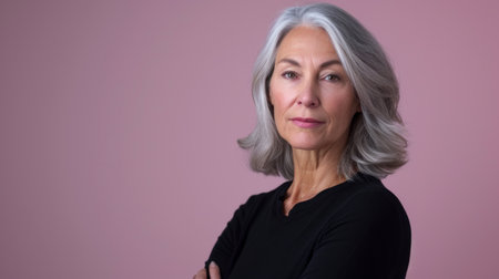 an older woman with gray hair and a black topの素材