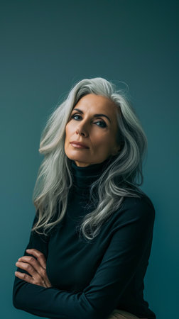 an older woman with gray hair posing for the cameraの素材
