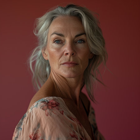 an older woman with gray hair and a floral topの素材