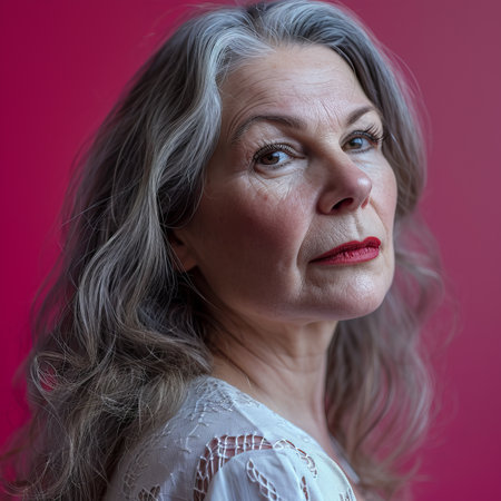 an older woman with gray hair and red lipsの素材