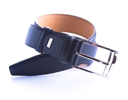 twisted leather belt isolated on white with shadowの写真素材
