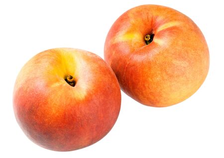 orange peaches isolated on whiteの写真素材