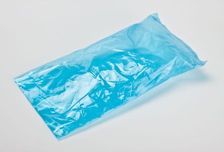 blue empty polyethylene package on grey backgroundの写真素材