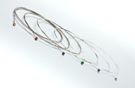 guitar nickel strings on grey background