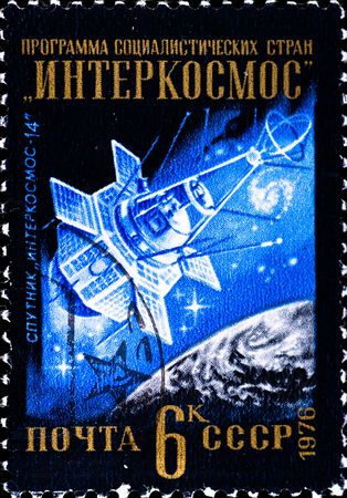 USSR - CIRCA 1976: postage stamp shows satellite "Intercosmos-14", circa 1976の写真素材