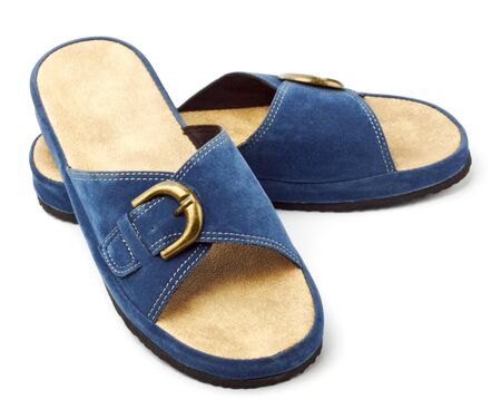 blue sneakers isolated on whiteの写真素材