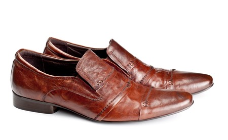 brown shoes pair isolated on whiteの写真素材