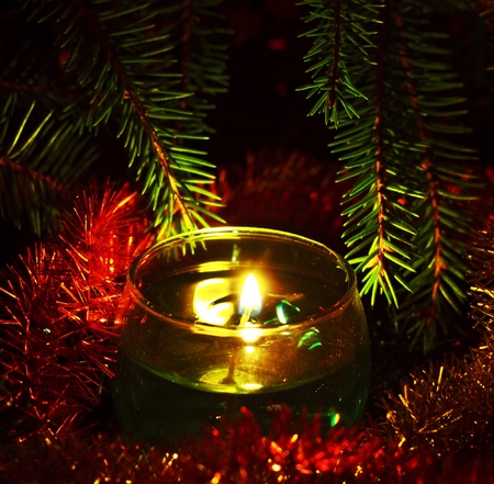 christmas card with candles and fir branchesの写真素材