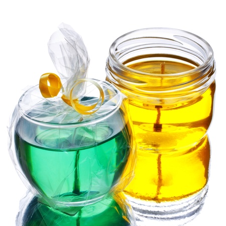 green and yellow gel candles isolated on whiteの写真素材