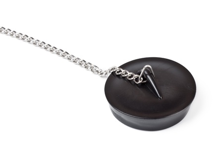 rubber plug for bath with chain isolated on whiteの写真素材