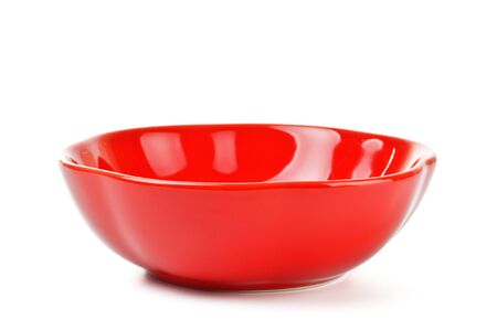 red salad bowl isolated on white backgroundの写真素材