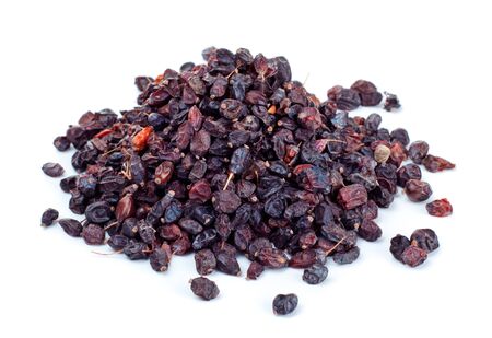 black dry barberry isolated on white backgroundの写真素材