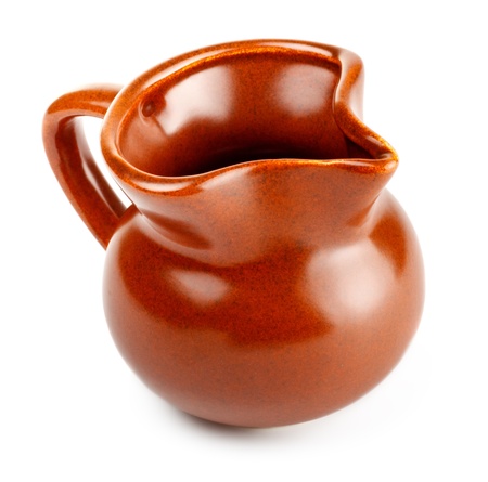 clay milk jug isolated on white backgroundの写真素材