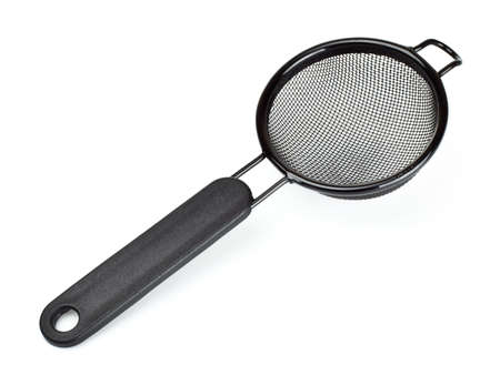 black tea strainer isolated on white backgroundの写真素材