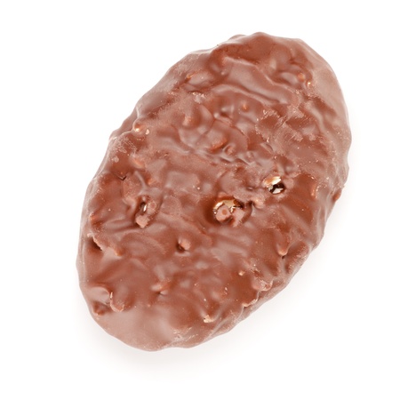 chocolate candy with nuts isolated on whiteの写真素材