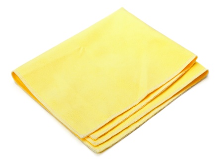 yellow microfiber duster isolated on white backgroundの写真素材