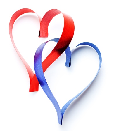 two heart shaped ribbons isolated on whiteの写真素材