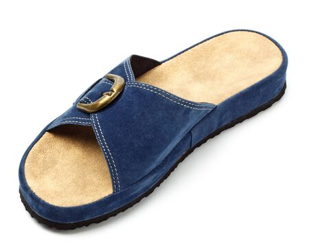 single blue slipper isolated on white backgroundの写真素材