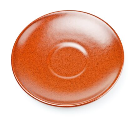 brown ceramic saucer isolated on white backgroundの写真素材
