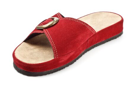 single red slipper isolated on white backgroundの写真素材