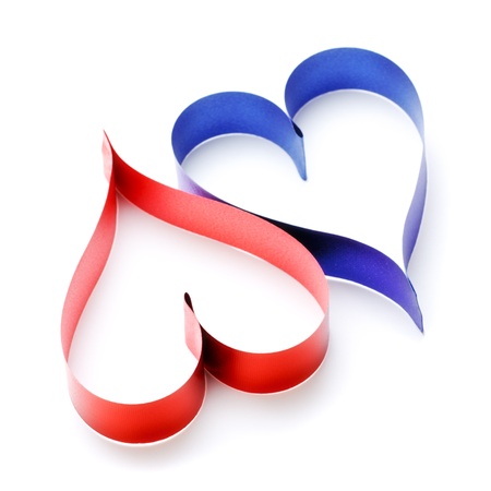 two heart shaped ribbons isolated on whiteの写真素材