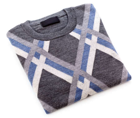 folded gray sweater isolated on white backgroundの写真素材