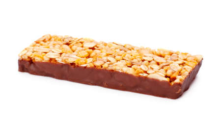 muesli bar in chocolate isolated on white backgroundの写真素材