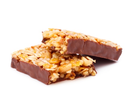 muesli bar in chocolate isolated on whiteの写真素材